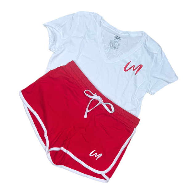 This stylish glow shorts set is designed for confident women who are determined to manifest success in every aspect of their lives. The white v-neck shirt and colored shorts front design features our brand name initials with our brand name in the back. The glow shorts are available in red, pink, navy and black.