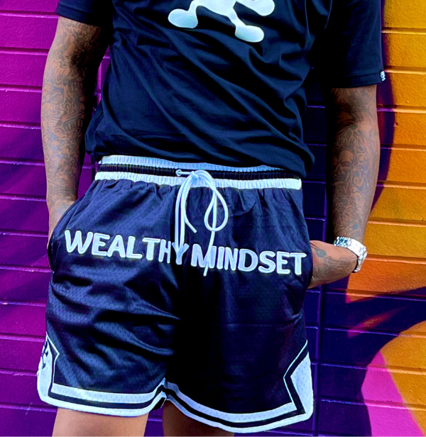 These unisex black mesh ﻿shorts﻿ are made for comfort and to be versatile. They are perfect for playing sports or to rock on a chill day. It is made with premium materials featuring a high quality print of our brand name in the front and signature logo on the both sides of the shorts.